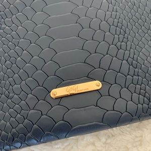 GiGi New York fold-over hybrid bag in dark blue